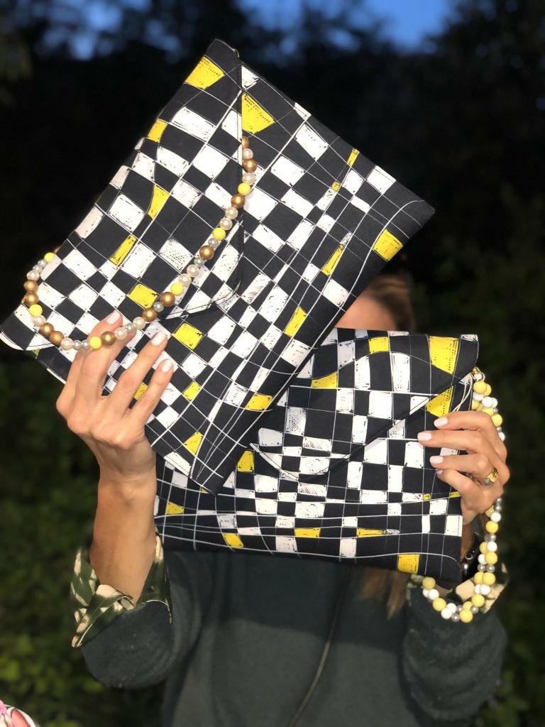 Checkered clutch sale